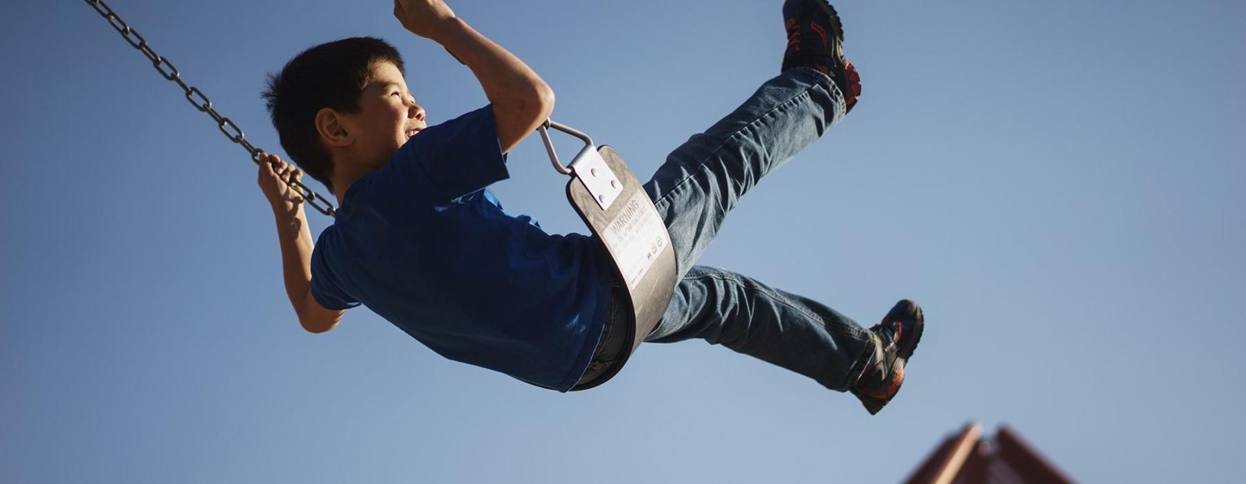 a boy on a swing