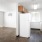 kitchen and living area with large windows
